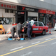 Mechanics wrenching on a Taxi (Photo: Michael Tracy)